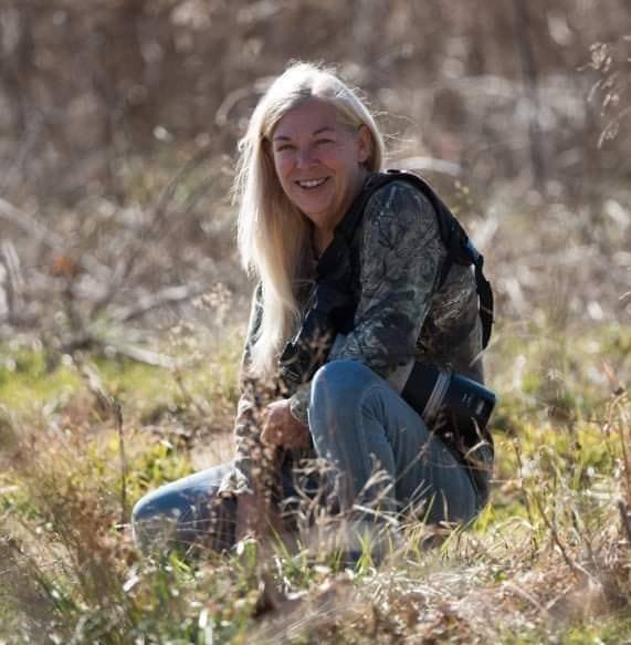 272402717_10226830760978757_2724695907623784947_n a person sitting in a field