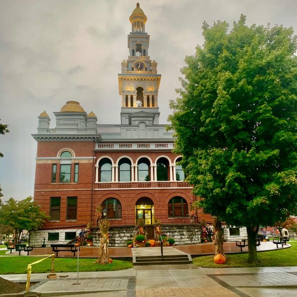 a small clock tower in front of Independence Hall