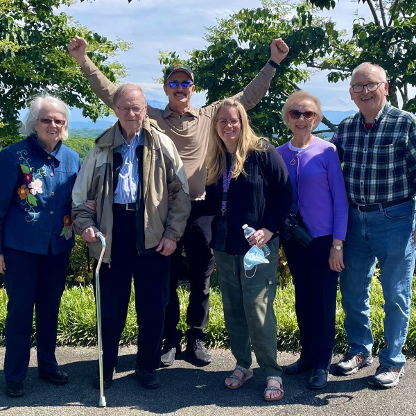 a group of people posing for the camera