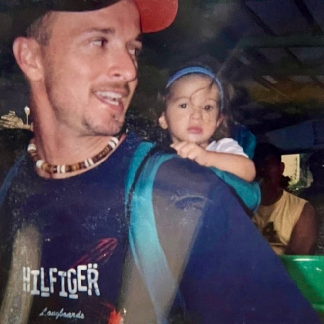 a man and a child taking a selfie