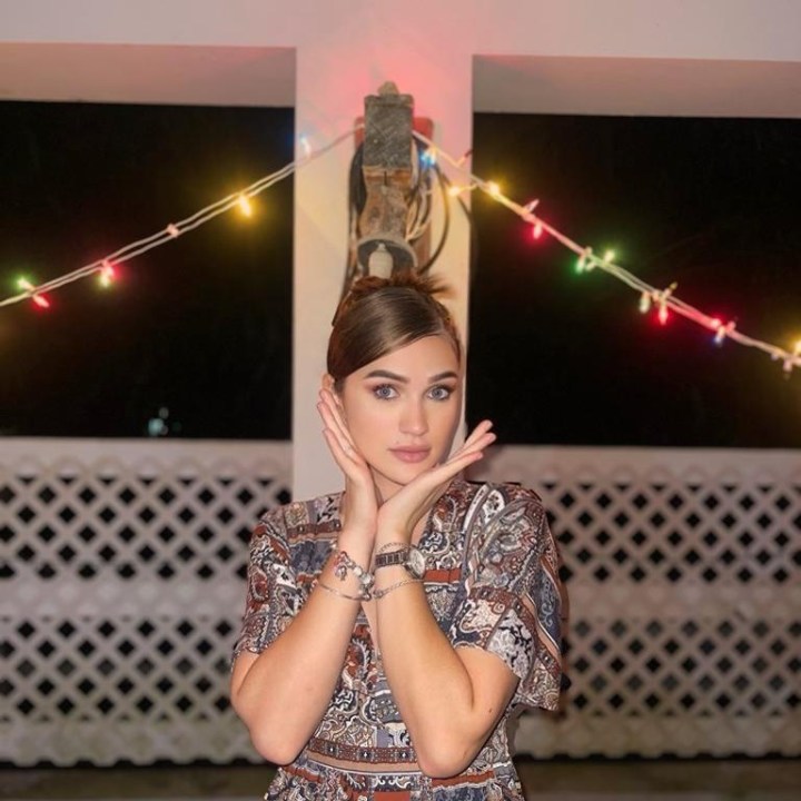 a woman standing in a room